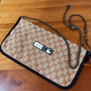 Gucci travel shoe bag. Can be used as a bum. bag or cross body as well.